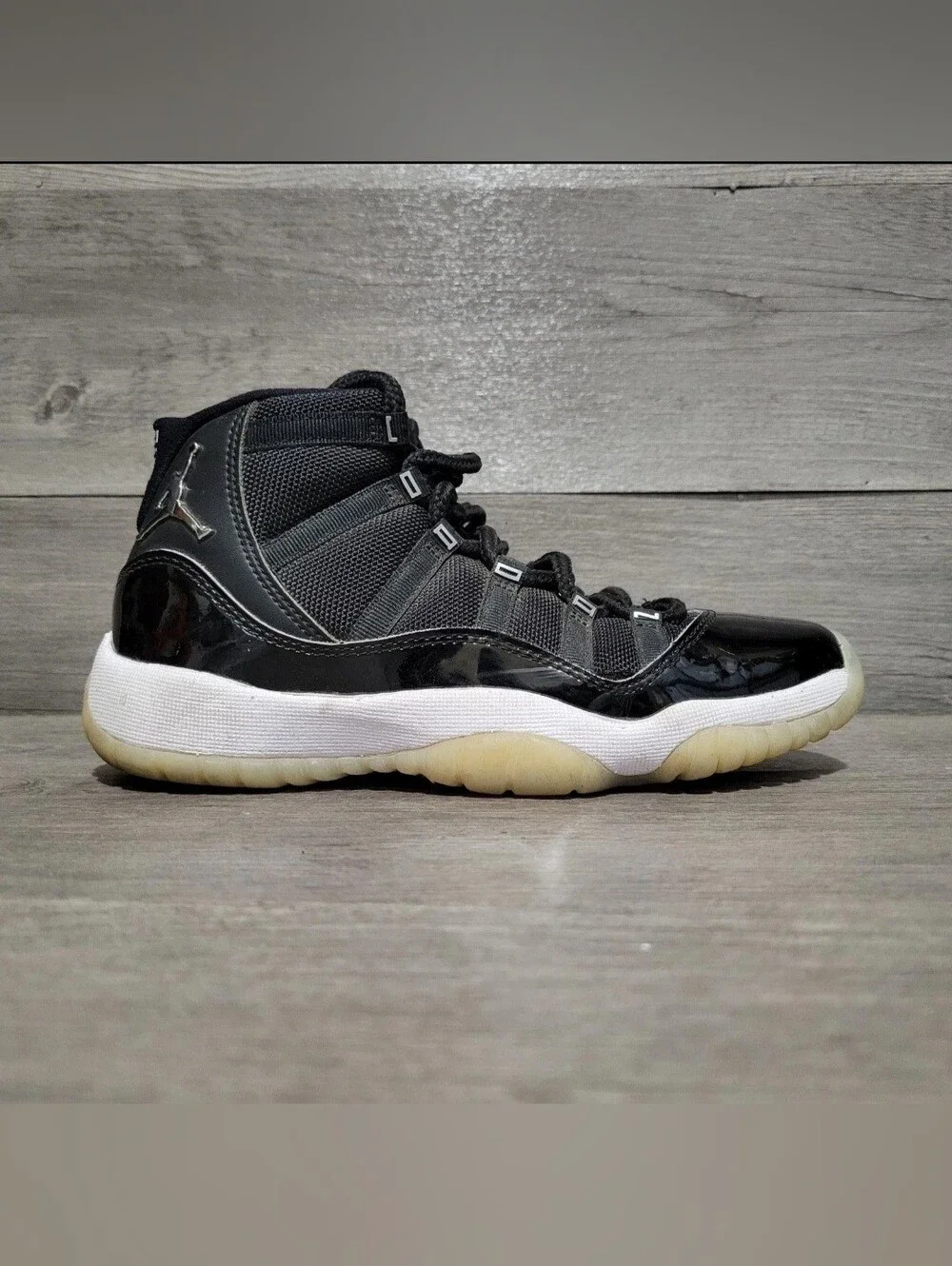 Jordan Kids Black and White High-Top Sneakers